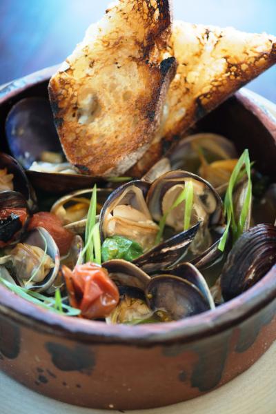 Wood Oven Clams with Sake Butter, Padrones and Cherry Tomatoes